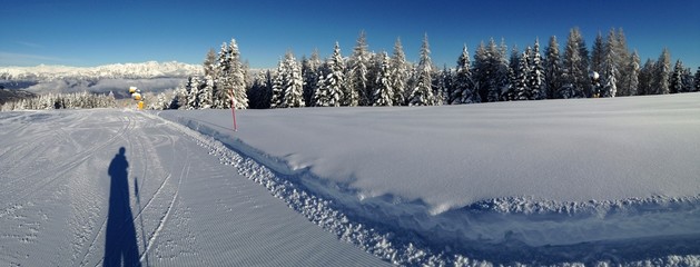 fotografo su pista da sci