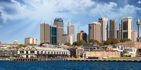 Fototapeta na wymiar Skyscrapers of Sydney Harbour in Port Jackson, natural harbour o