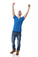 Young happy man celebrating success