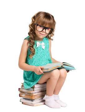  girl  siting on pile  books