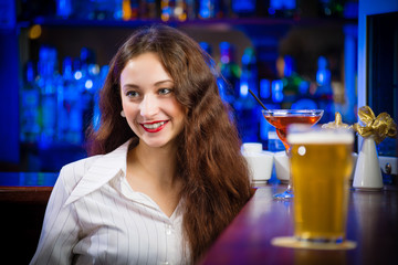young woman in a bar
