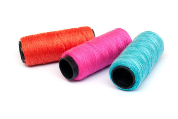Spool of coloured  thread.