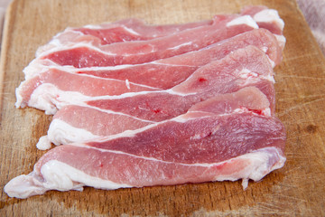 fresh raw meat on wooden background