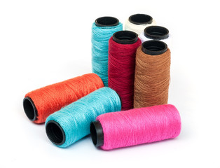 Spool of coloured  thread.