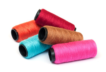Spool of coloured  thread.