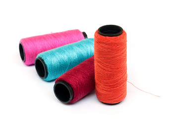Spool of coloured  thread.
