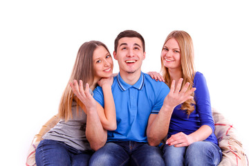 friends sitting on a sofa and watching television on white backg