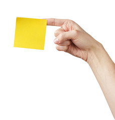 adult man hand holding sticky note