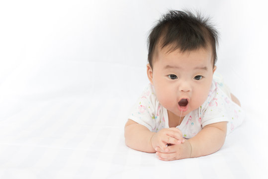Asian baby girl on isolated white background