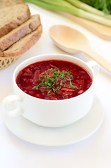 Red borscht soup with dill