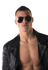 Attractive young man shirtless, wearing black leather trench