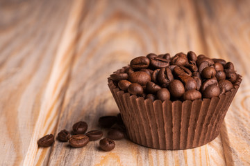 cake of coffee beans on the wooden table
