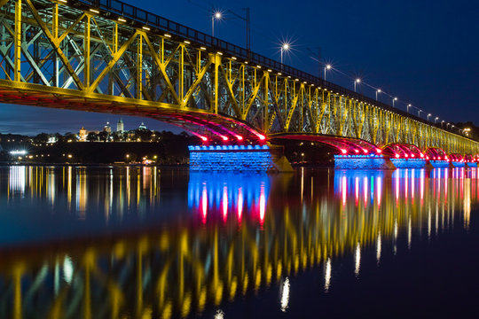 Illuminated bridge and city