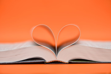 Pages of Book Heart Background Orange