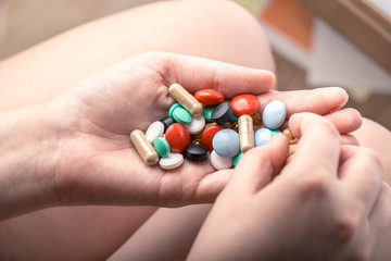 Pills in womans hands