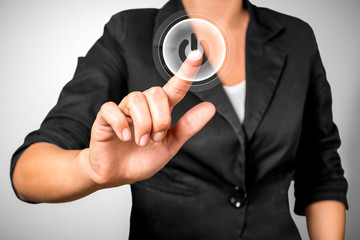 Picture of woman's hand pressing virtual power button.