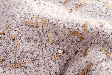 Cream weaved fabric with sequin