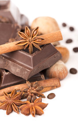 chocolate bars with its ingredients isolated on white background