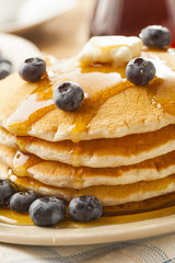 Homemade Buttermilk Pancakes with Blueberries and Syrup