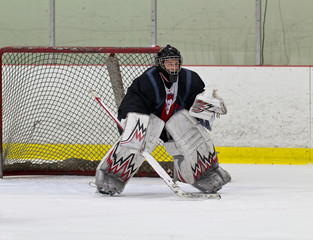 Naklejka premium Hockey goaltender ready to make a save