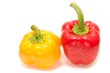 Yellow And Red Capsicums Isolated On White Background