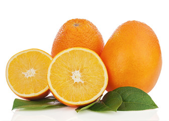 Orange fruits with green leaves isolated on white background.