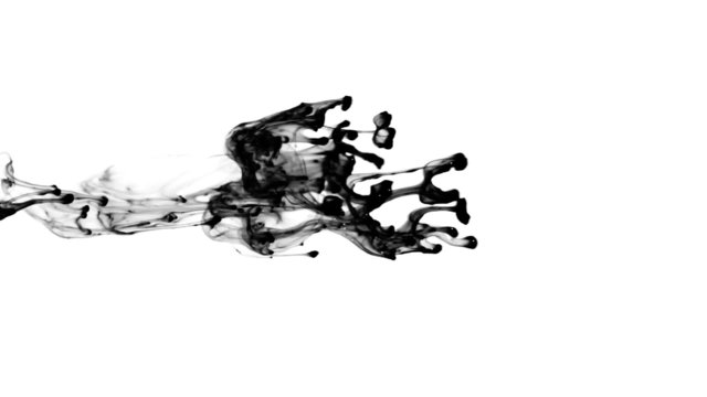 Ink spreads. Liquid ink splash in water.