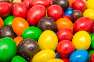 Fototapeta na wymiar Colorful Mix Of Coated Chocolate Candy Close Up