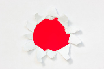 Paper with red hole inside