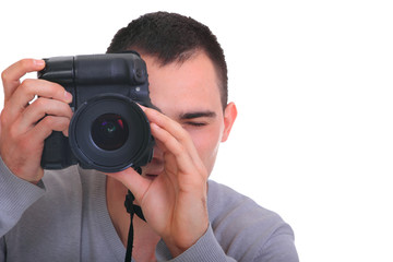 Young photographer with camera, isolated