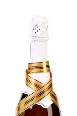 Bottle champagne with gold ribbon.