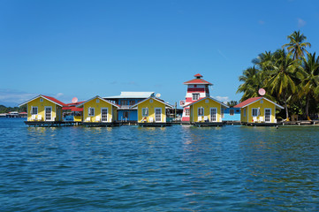 Tropical vacation bungalows over water