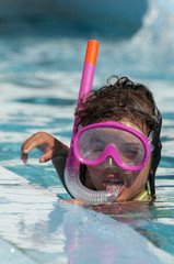 little girl with a mask for diving