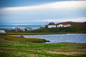 Icelandic Landscape with Small Location at Fjord Coastline