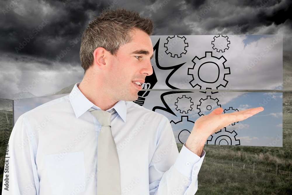 Poster composite image of smiling businessman looking at hand
