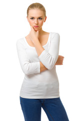 Young serious girl in jeans