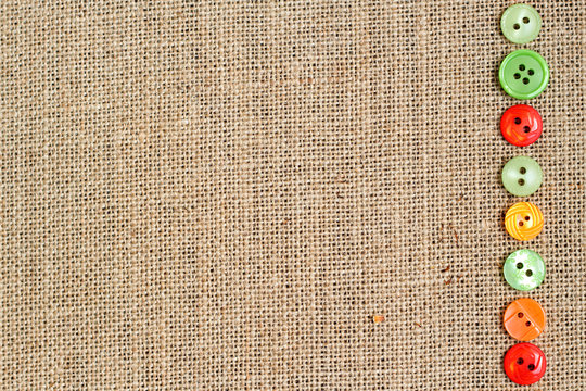 Burlap Background With Buttons Border