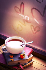 rosehip tea on old books