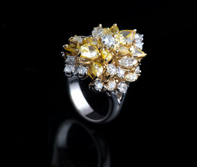 Diamond ring shot on a black reflective background