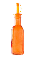 Empty orange glass bottle