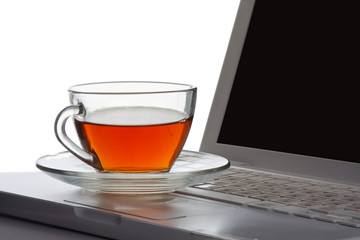 Laptop and a cup of tea.
