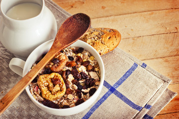 healthy breakfast background/ bowl of oat flake with raisins