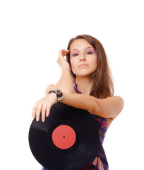 Party woman with vinyl disc as a microphone