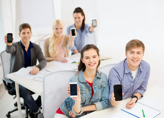 students showing black blank smartphone screens