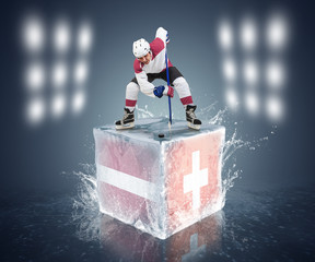 Latvia - Switzerland game. Face-off player on the ice cube.