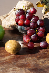 still life Fruits with Chinese pear,kiwi,Red apple,grapes and Cu