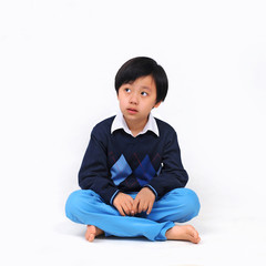 Cute Asian boy model posing in casual wear