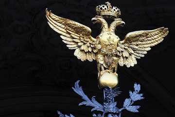 Golden two-headed eagle on Winter Palace gates. St. Petersburg