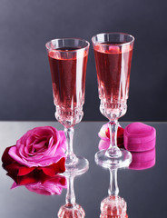 Composition with pink  wine in glasses and  roses