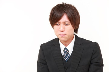 困惑するビジネスマン